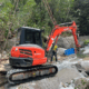 Removing a boulder after a cyclone